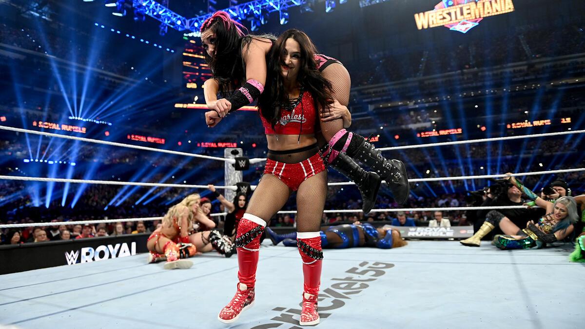 Nikki Bella with Roxanne Perez on her shoulders at WWE Royal Rumble 2025