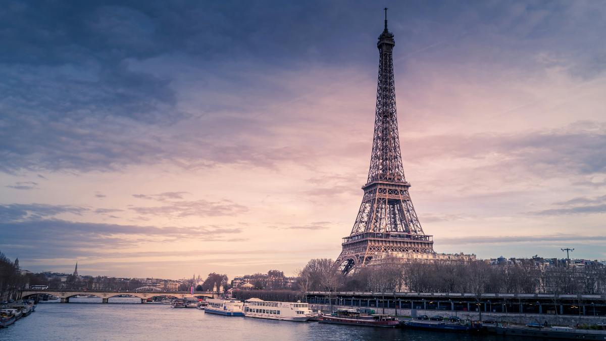 Eiffel Tower next to the river in Paris