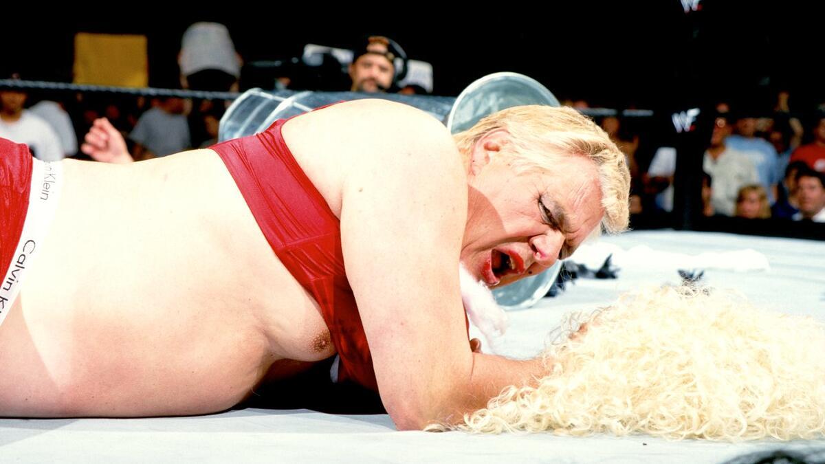 Pat Patterson in a red bra at WWE King of the Ring 2000