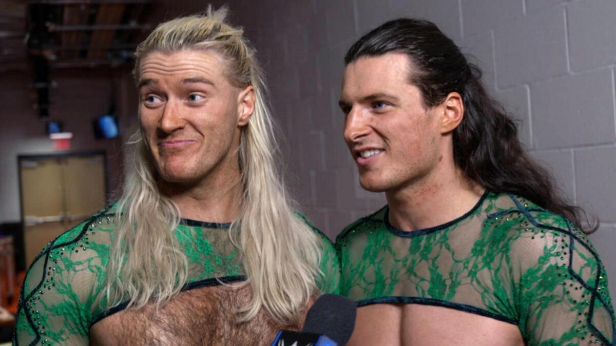 Pretty Deadly smiling backstage in WWE