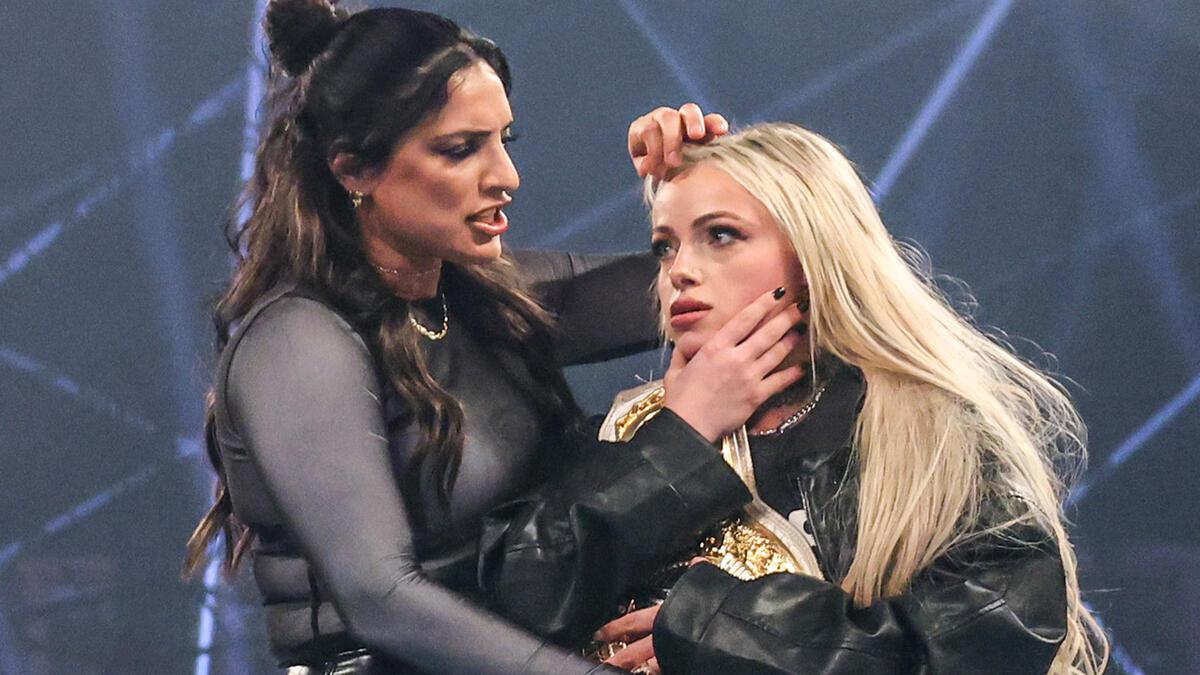 Raquel Rodriguez comforts Liv Morgan following a physical confrontation on WWE Raw in 2024