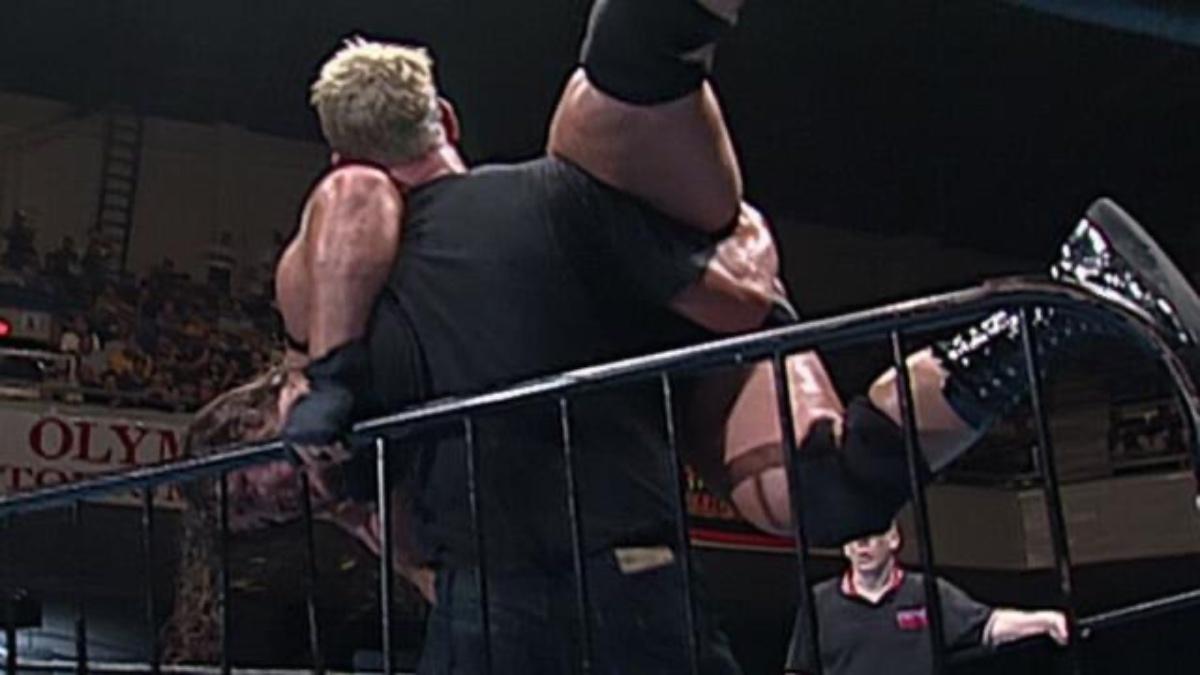 Sandman picking up Rhino at ECW Heat Wave 2000