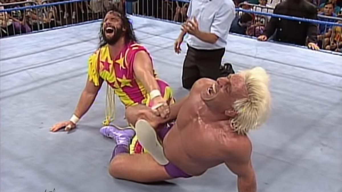 Ric Flair with a Figure Four Leglock on Randy Savage