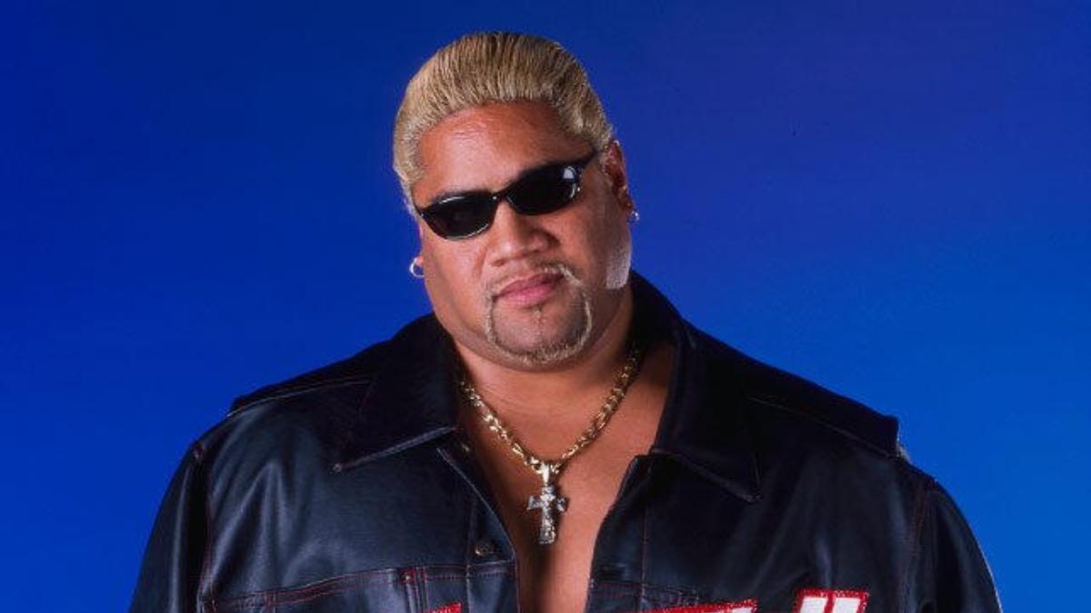 Rikishi wearing sunglasses and a leather jacket