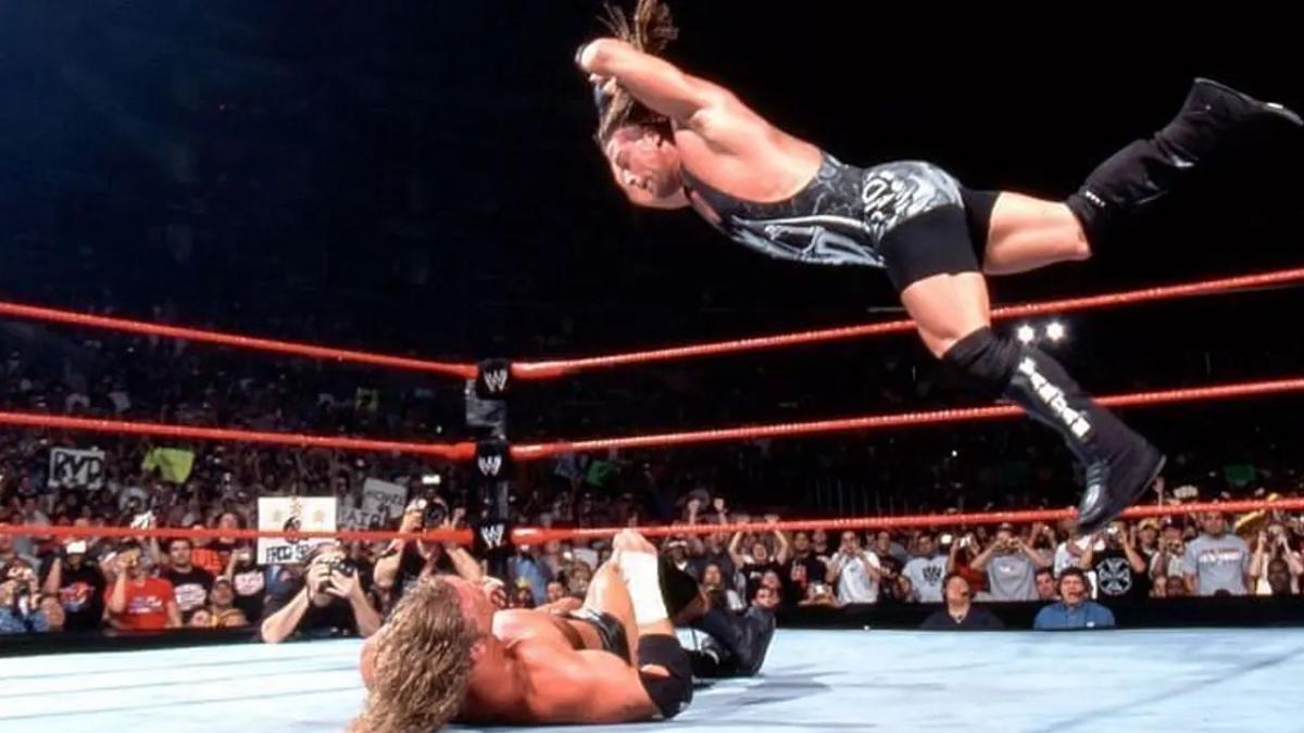 Rob Van Dam hitting a Five Star Frog Splash to Triple H