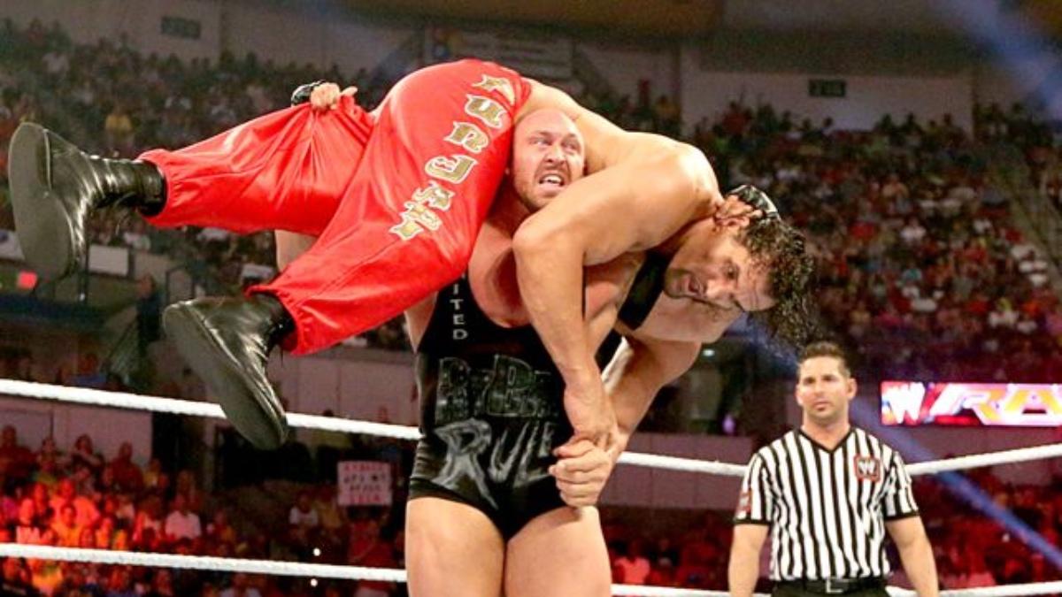 Ryback hitting The Great Khali with his Shellshock finishing move