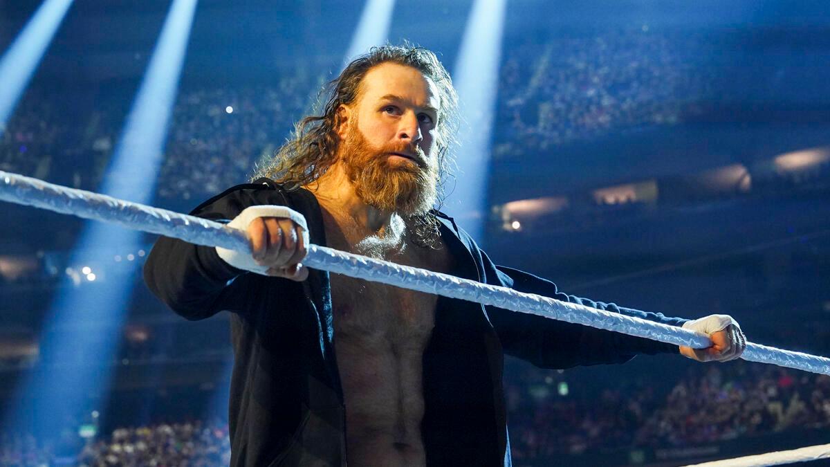 Sami Zayn in the ring with a black hoodie on at WWE Elimination Chamber 2025