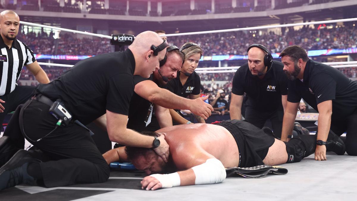 Samoa Joe attended to by medical staf at AEW All In Texas