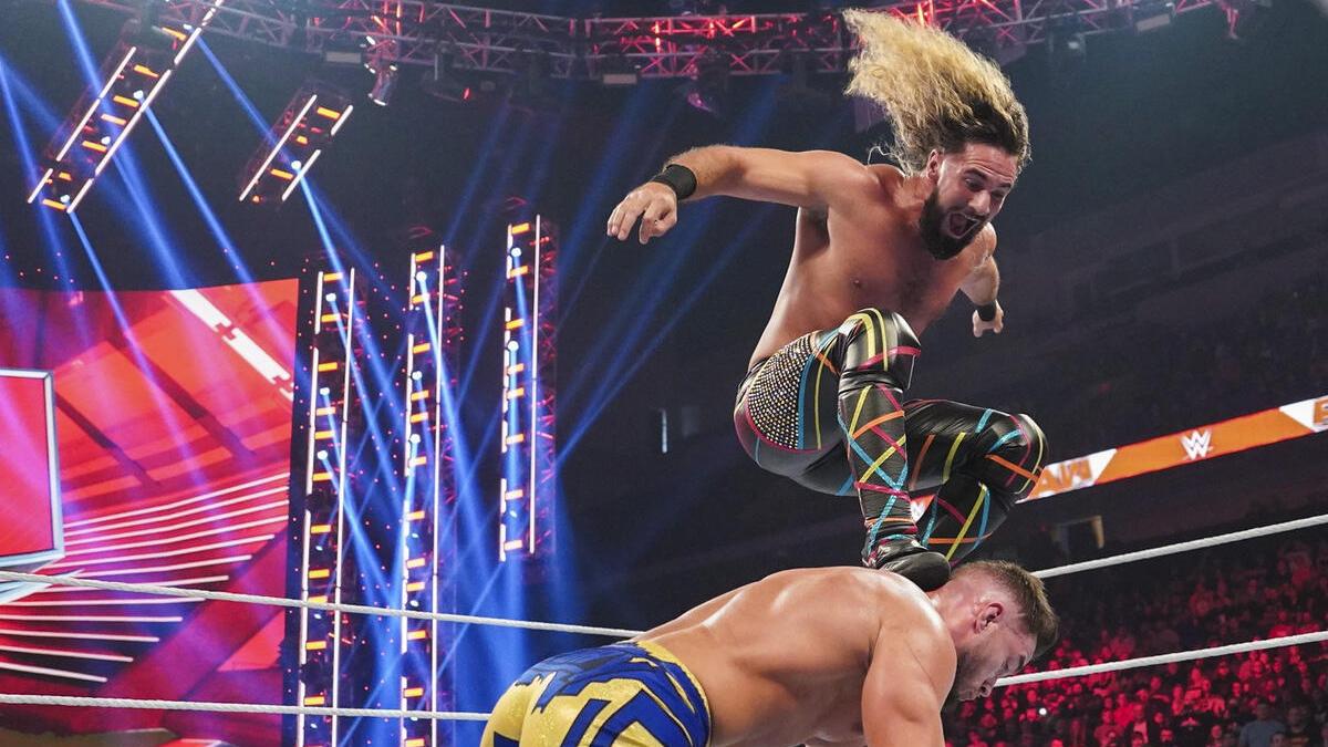 Seth Rollins giving Austin Theory a Stomp on November 7, 2022 episode of WWE Raw
