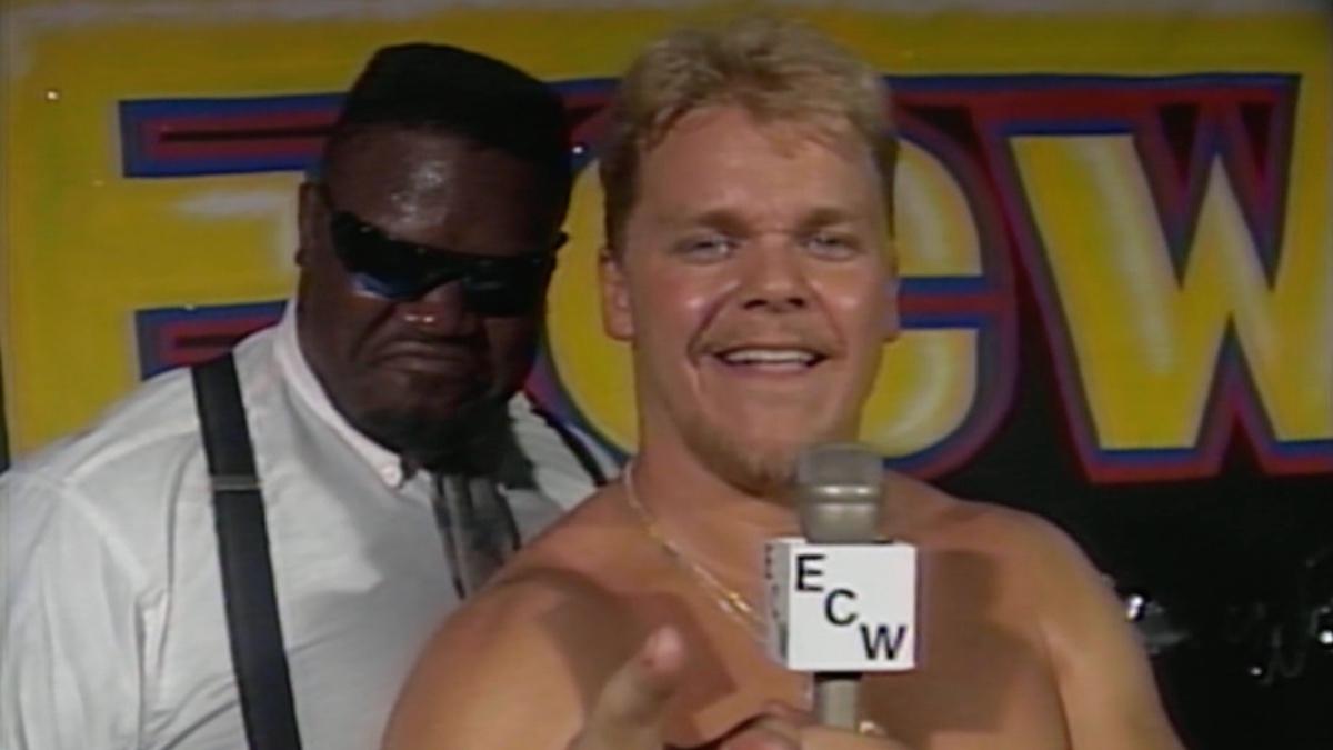 Shane Douglas with Mr. Hughes in ECW