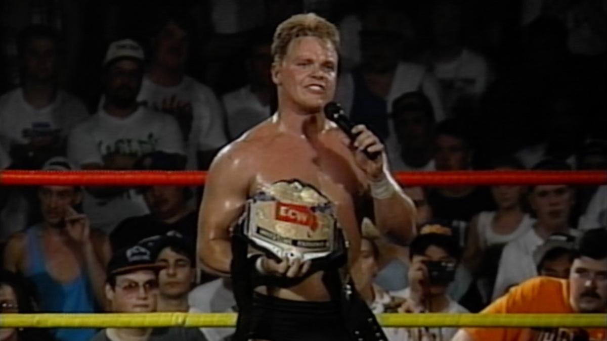 Shane Douglas holding the ECW World Heavyweight Title