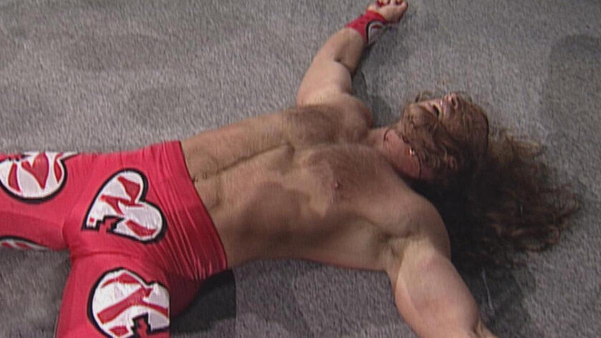 Shawn Michaels in pain after landing on the casket at WWE Royal Rumble 1998