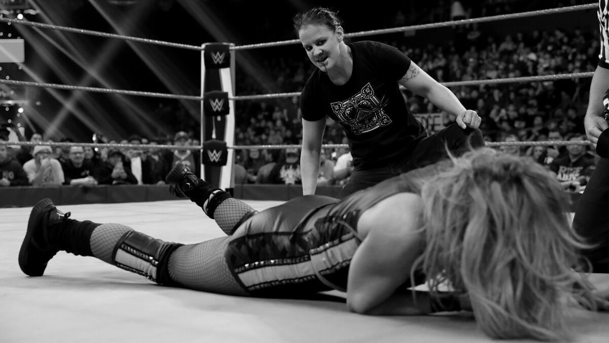 Shayna Baszler biting Becky Lynch