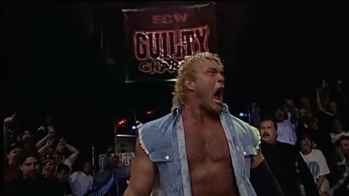 Sid Vicious shouting in a denim vest at ECW Guilty as Charged 1999