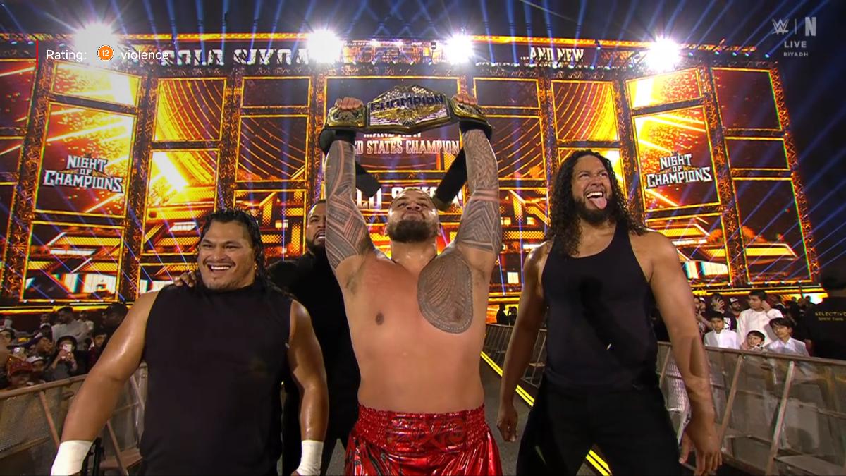 Solo Sikoa celebrating with Hikuleo, Tonga Loa, and JC Mateo