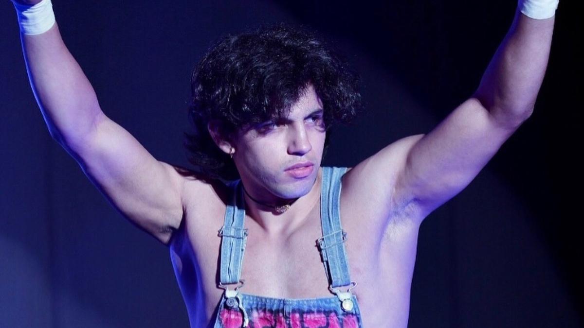 Starboy Charlie in dungarees