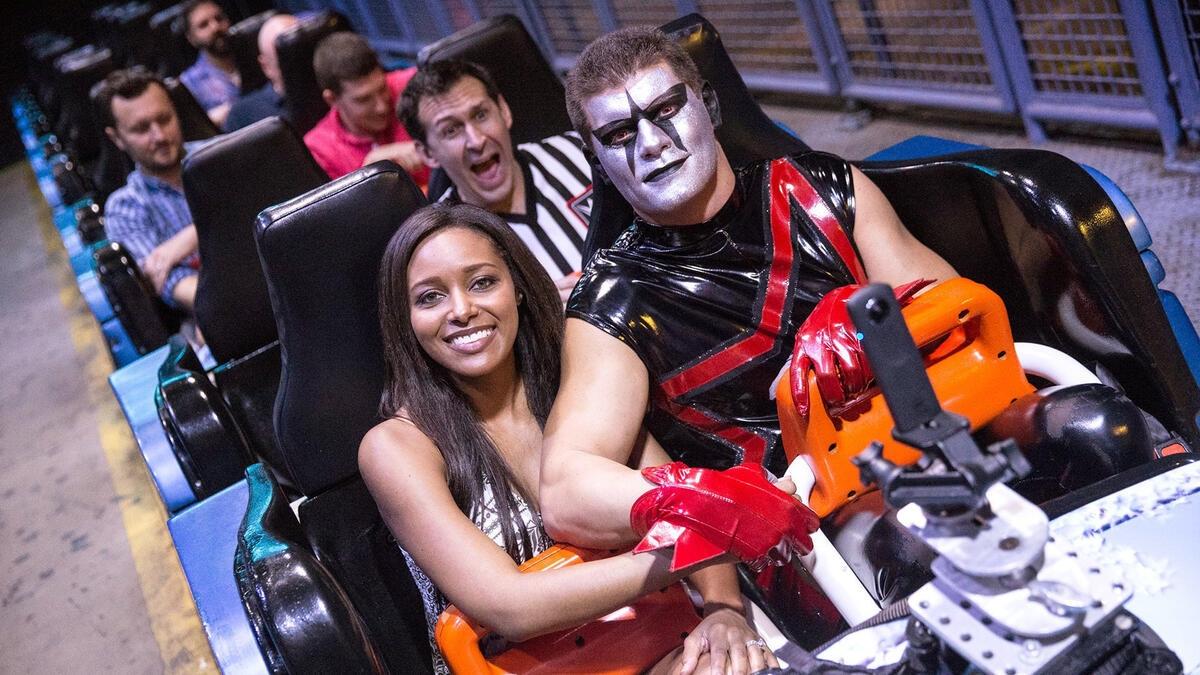Stardust (Cody Rhodes) and Brandi Rhodes on a rollercoaster