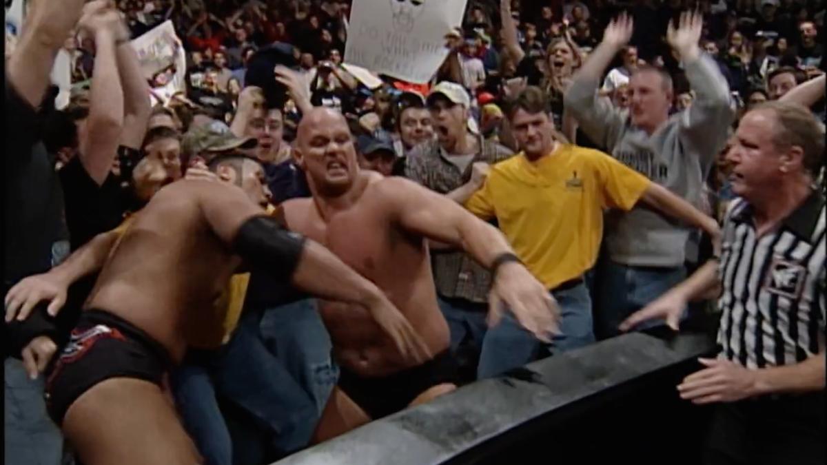 The Rock and Steve Austin brawling in the crowd on the November 16, 1998 episode of WWE Raw