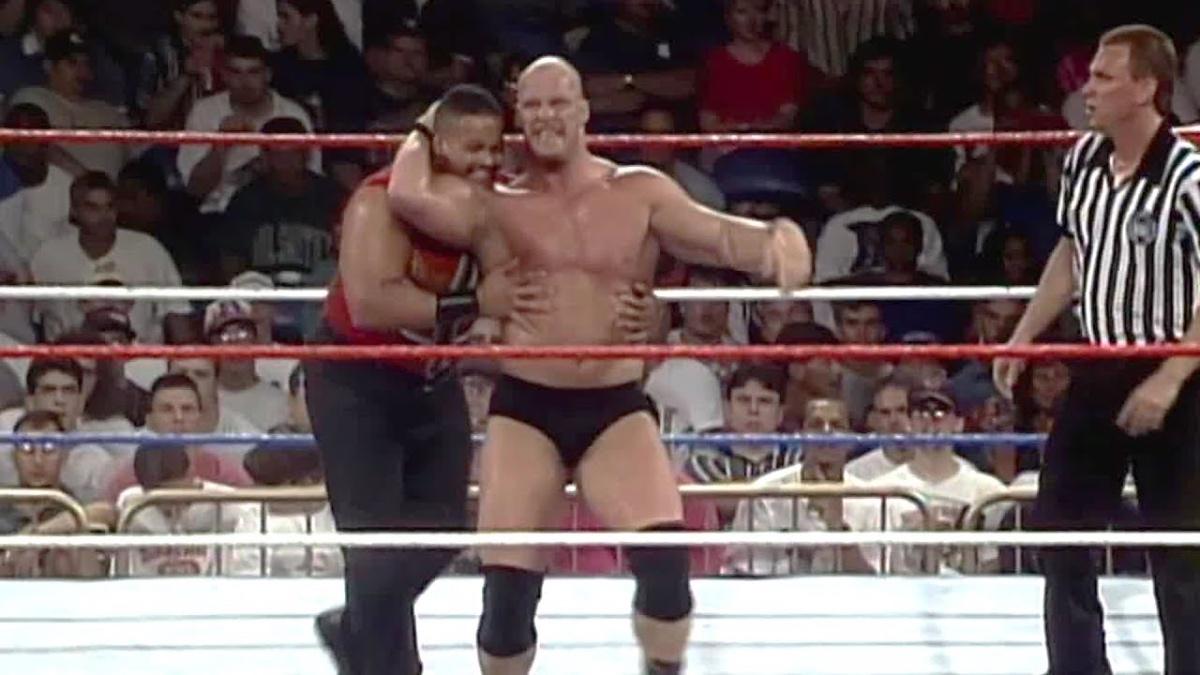 Steve Austin hitting a Stone Cold Stunner to Savio Vega