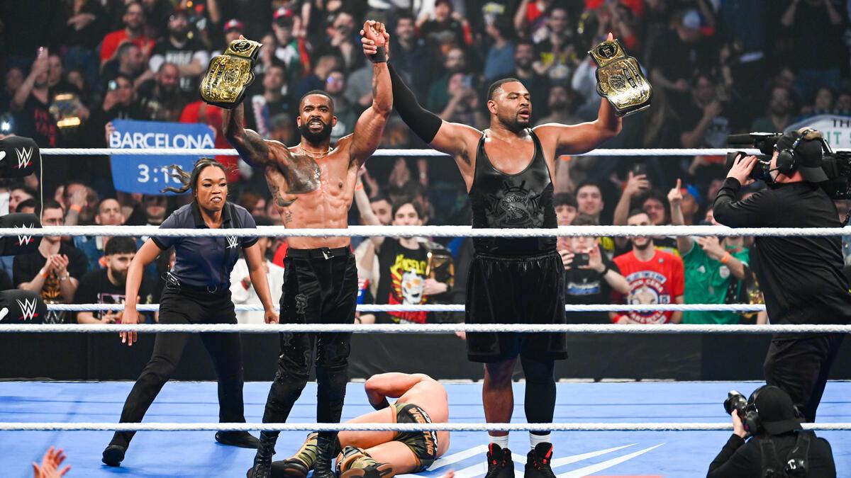 Street Profits with the WWE Tag Team Titles