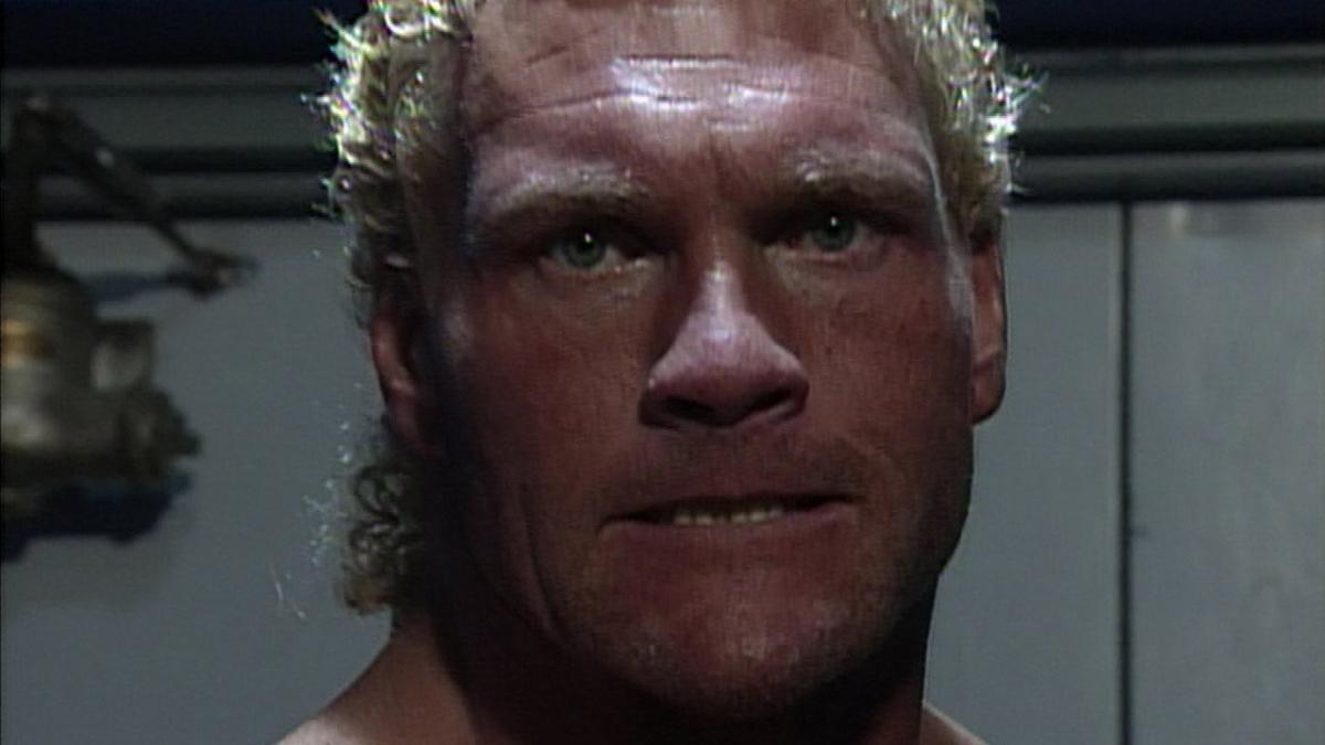 Sycho Sid waiting to cut his promo looking at the camera at WWE In Your House 14