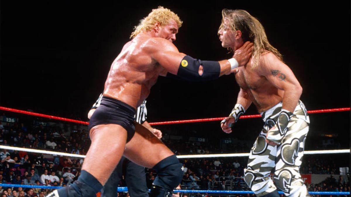 Sycho Sid and Shawn Michaels in an exchange at WWE Survivor Series 1996