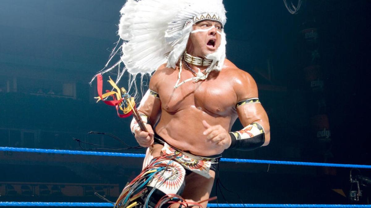 Tatanka celebrating in a WWE ring