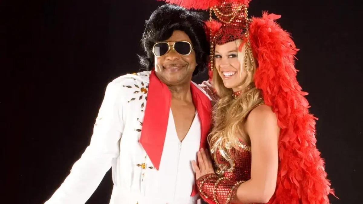 Teddy Long dressed as James Brown