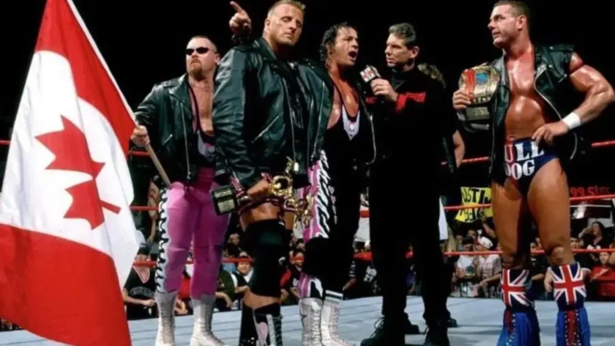 The Hart Foundation in the ring on WWE TV in 1997