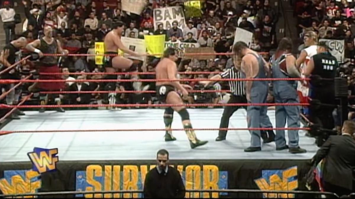 The New Age Outlaws, The Godwinns, The Headbangers and New Blackjacks  at Survivor Series 1997 stood in the ring
