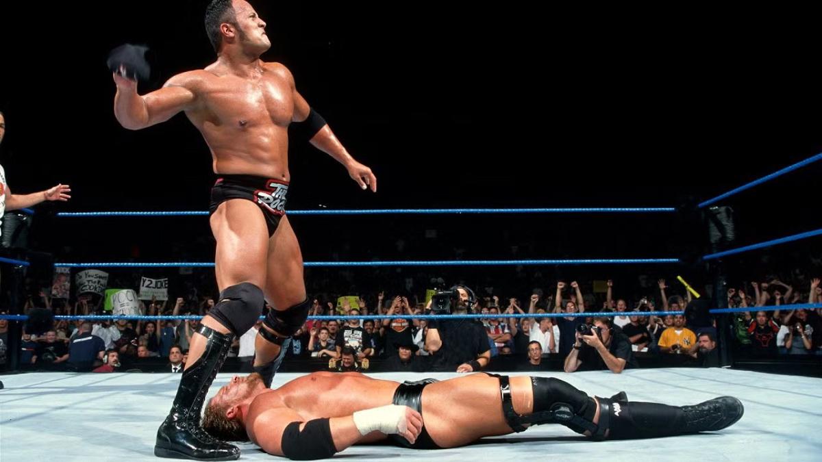 The Rock People's Elbow to Triple H