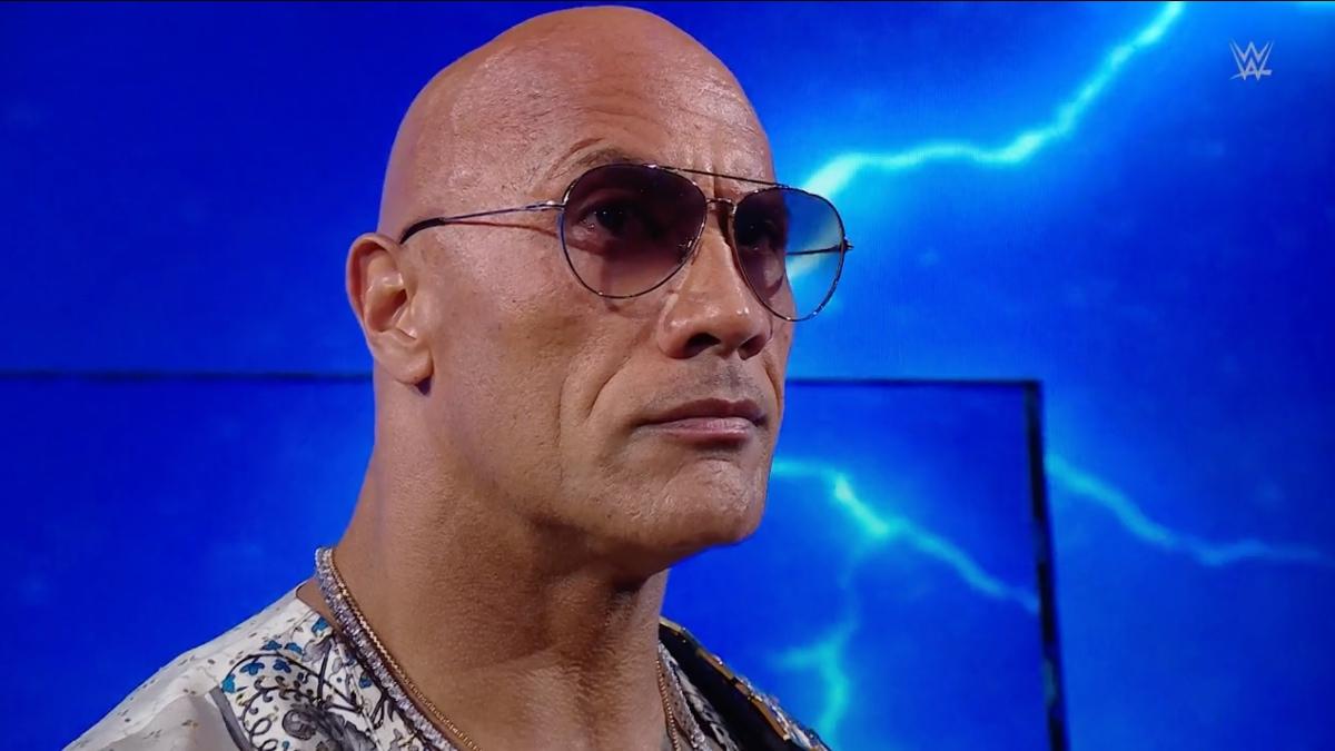 The Rock raising his eyebrow at WWE Bad Blood 