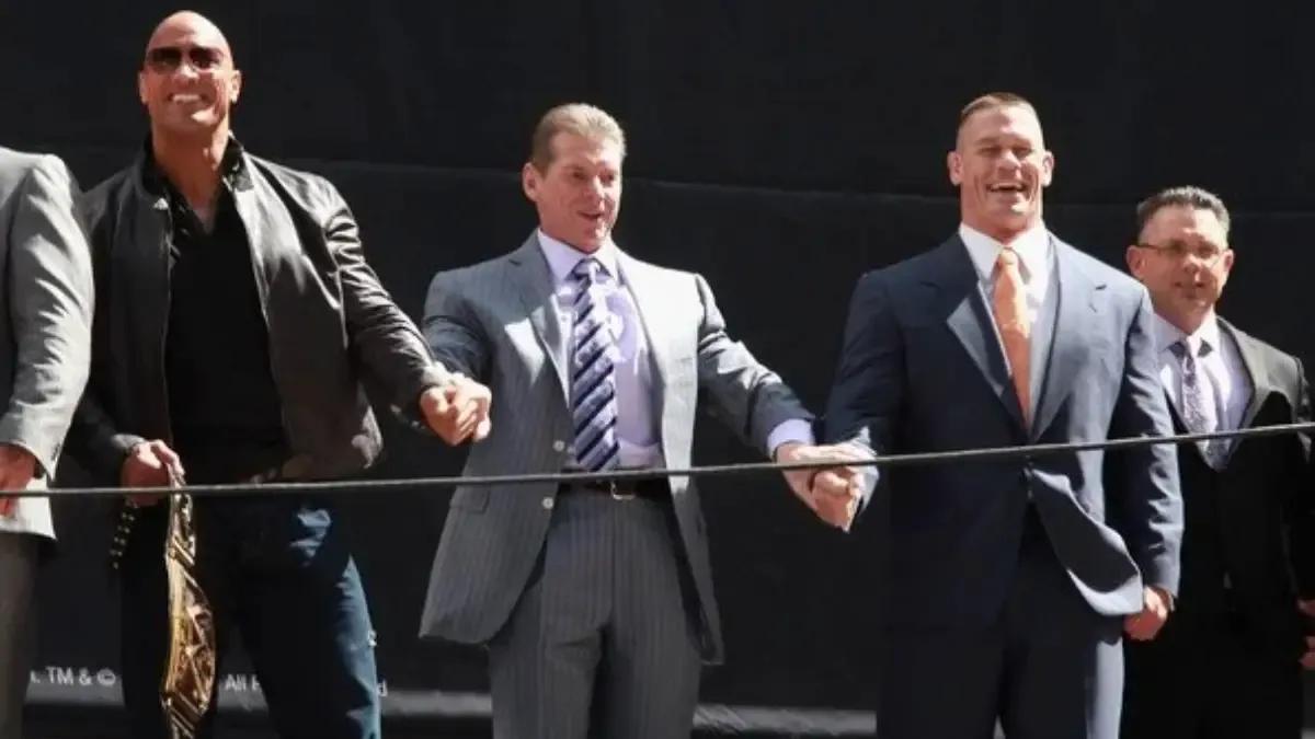 The Rock Vince McMahon John Cena.jpg