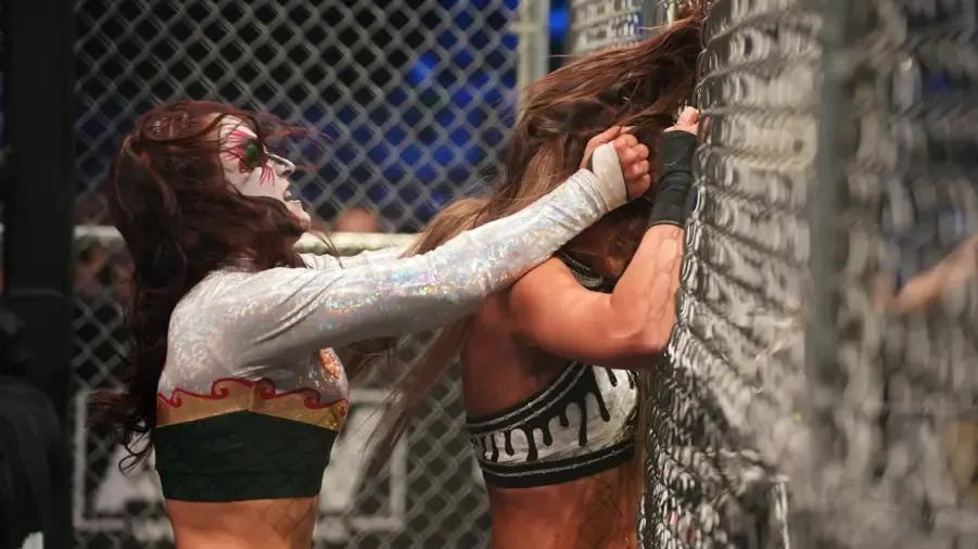 Thunder Rosa smashes Britt Baker-s heed in.png