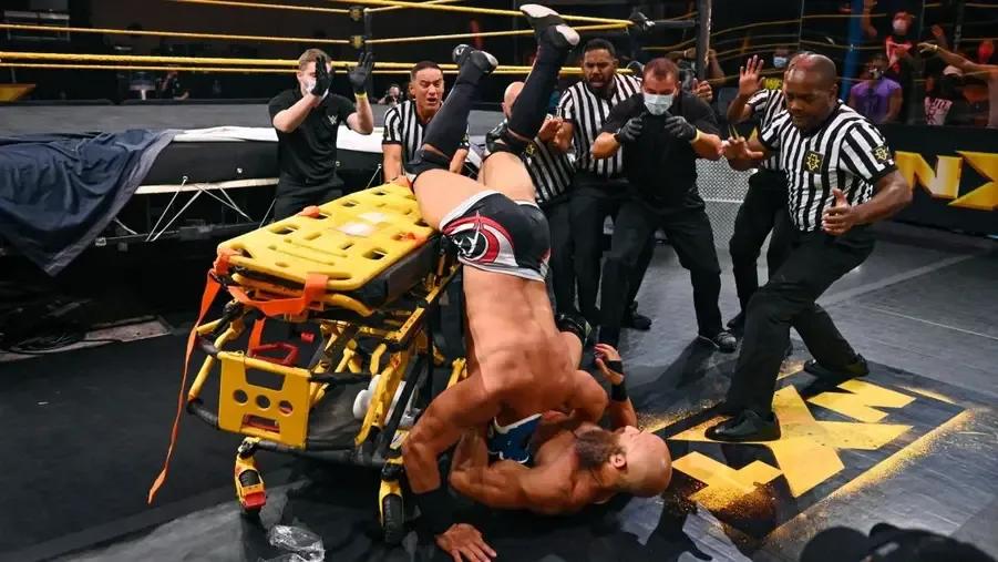 Tommaso Ciampa DDT on Jake Atlas.jpg