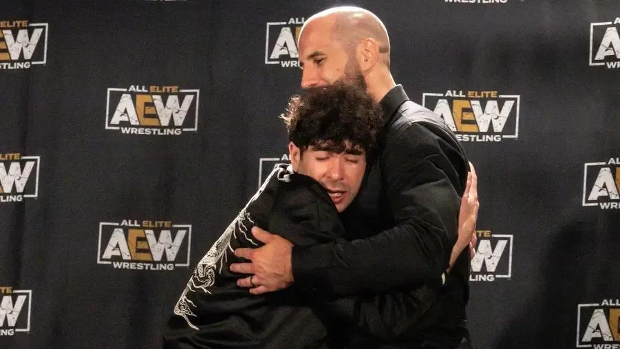 Tony Khan Claudio Castagnoli awkward hug.jpg
