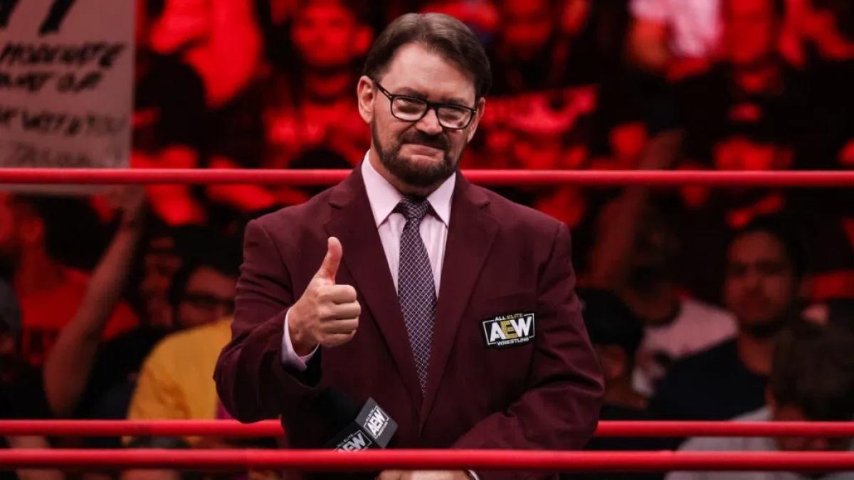 AEW announcer Tony Schiavone standing in the ring and giving a thumbs up.