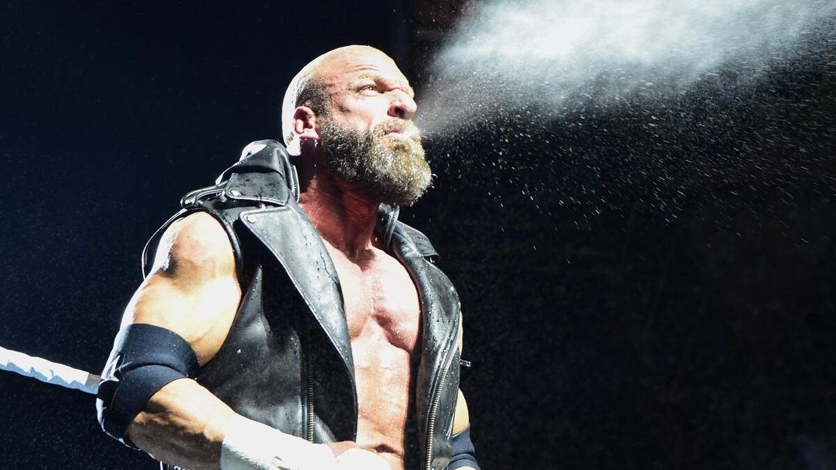 Triple H spits water from his mouth while making his entrance at WWE Greatest Royal Rumble 2018