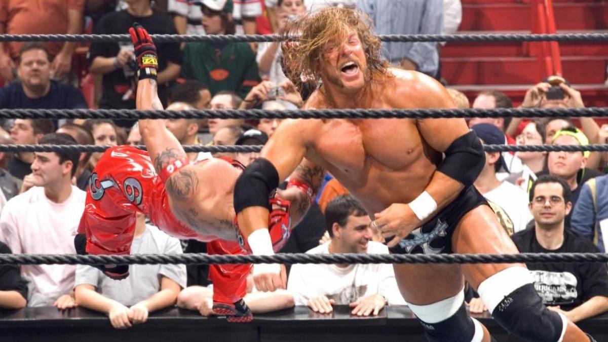 Triple H hitting Rey Mysterio with a clothesline at WWE Royal Rumble 2006