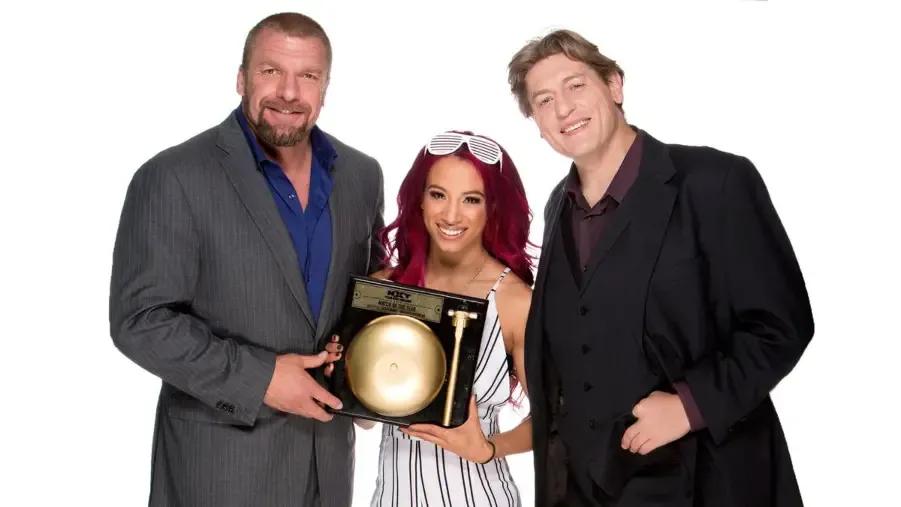 Triple H Sasha Banks William Regal NXT 2015.jpg