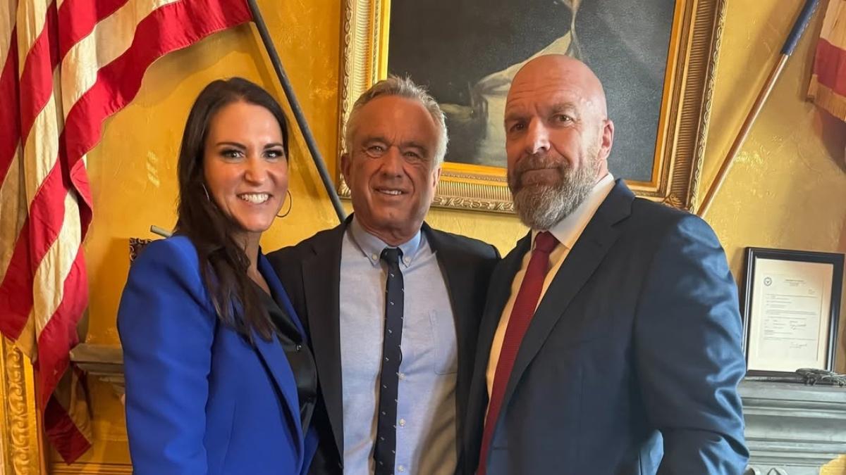 Triple H and Stephanie McMahon with Robert F. Kennedy Jr.