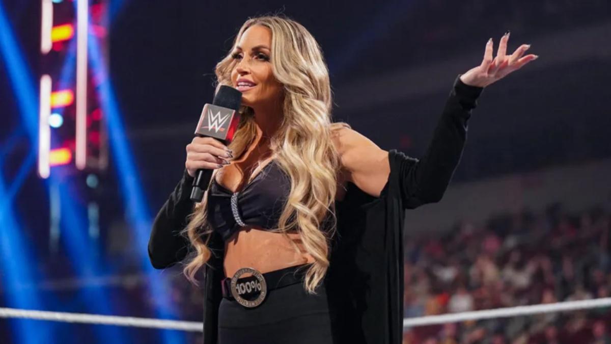 Trish Stratus talking into a microphone 