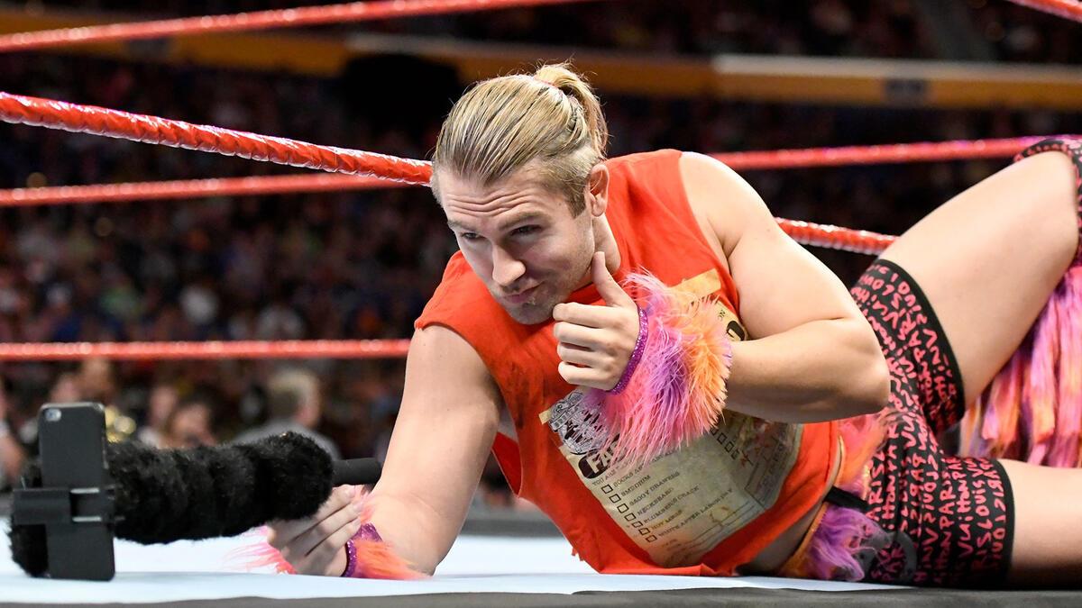 Tyler Breeze stops to take a selfie on the ring apron prior to a match on WWE Raw in 2018