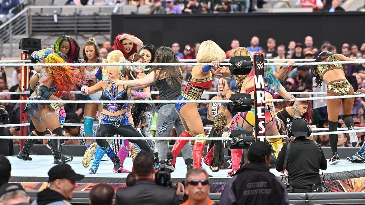 WWE female wresters brawling in the ring at WrestleMania 35