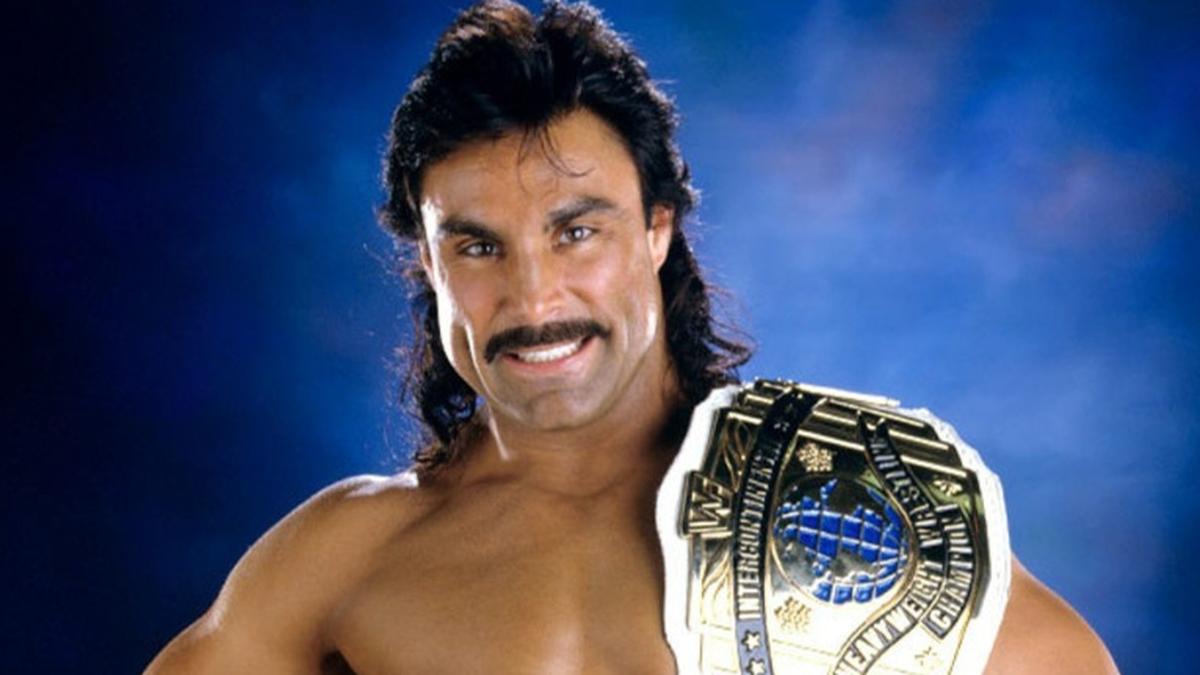 Studio shot of Marc Mero with the WWE Intercontinental Championship on his shoulder