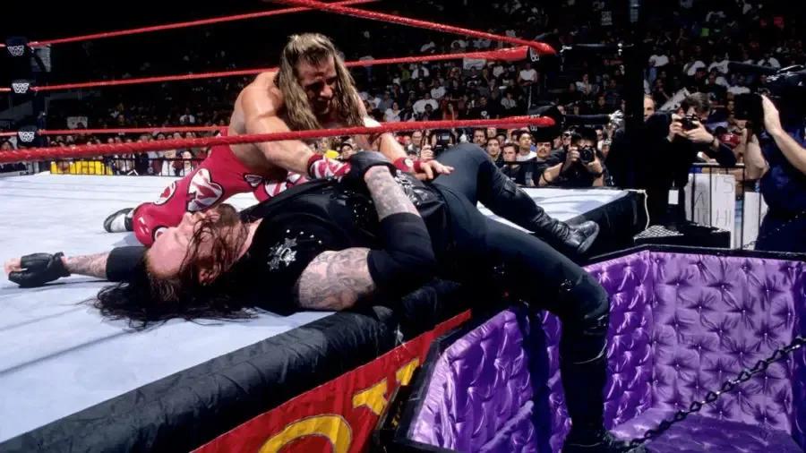 https://cultaholic.com/files/images/42b84833535f89cedaa273cae4741bdd0e8a951f-Shawn-Michaels-Undertaker.jpg