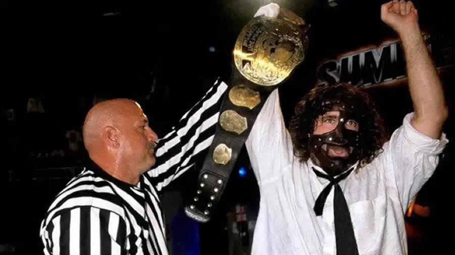 https://cultaholic.com/files/images/6e8298ce10a7c15271b1ec209f89466f127958ba-jesse-ventura-mankind-summerslam-1999.jpg