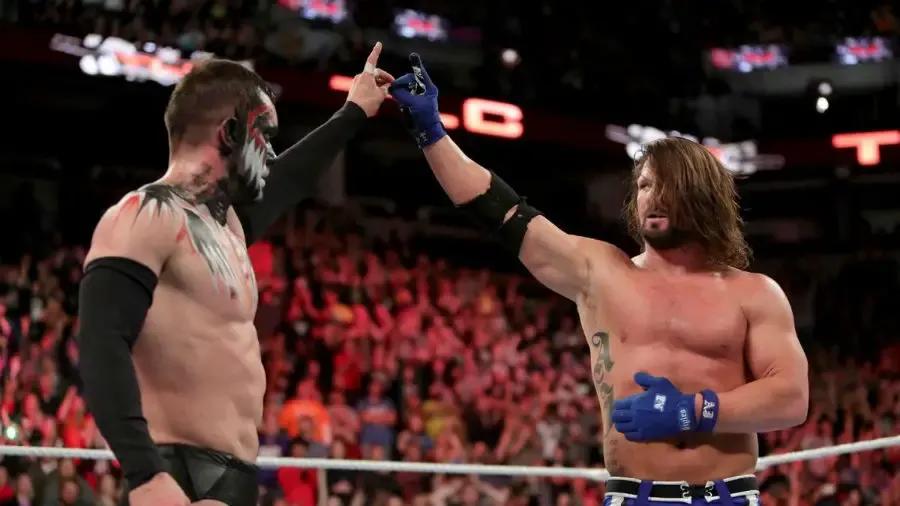 https://cultaholic.com/files/images/7b15fcae396ff40e4165927e95f69f31019fa462-Finn-Balor-AJ-Styles.jpg