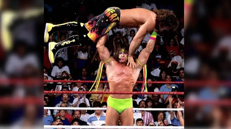 https://cultaholic.com/files/images/90ba44719f03af47c41987a176cd7efc10b68c87-ultimate-warrior-rick-rude.jpg