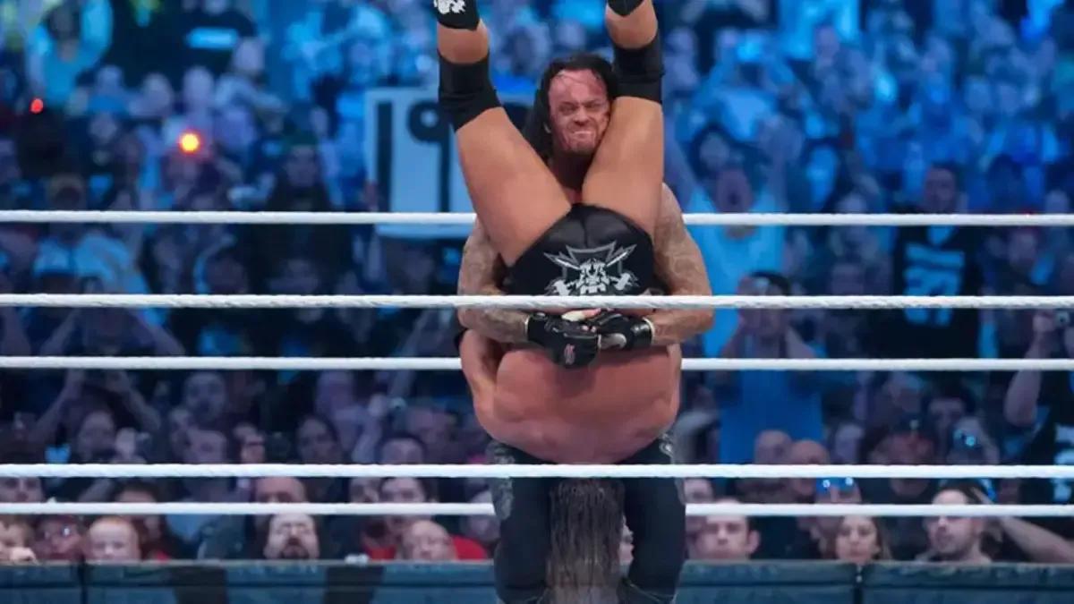 https://cultaholic.com/files/images/99b97eaca2b6c67198131dd19903a27e12af6145-the-undertaker-triple-h-tombstone.jpg